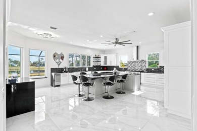 Custom Estate lakefront home in PGA Village. Experience refined - photo 5