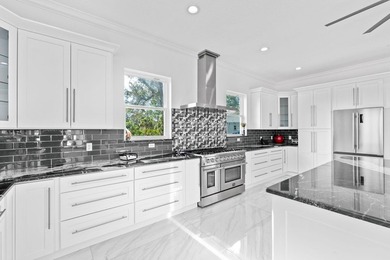 Custom Estate lakefront home in PGA Village. Experience refined - photo 6