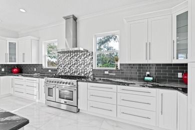 Custom Estate lakefront home in PGA Village. Experience refined - photo 8