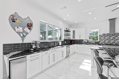 Custom Estate lakefront home in PGA Village. Experience refined - photo 10