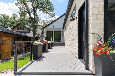 Welcome to an extraordinary lakeside retreat on the coveted - photo 4