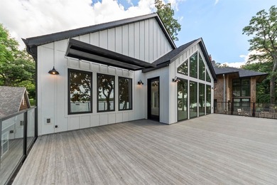 Welcome to an extraordinary lakeside retreat on the coveted - photo 5