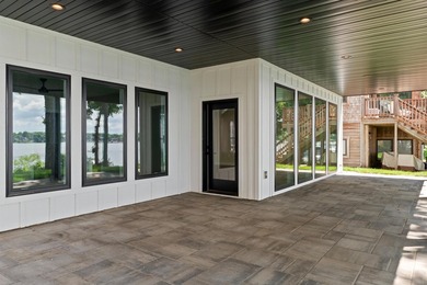 Welcome to an extraordinary lakeside retreat on the coveted - photo 7