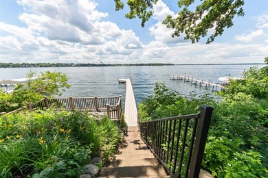 Welcome to an extraordinary lakeside retreat on the coveted - photo 8