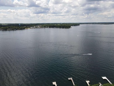Welcome to an extraordinary lakeside retreat on the coveted - photo 10