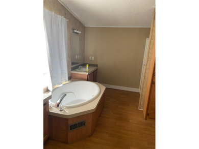 Welcome to peaceful waterfront living. This spacious 4-bedroom - photo 10