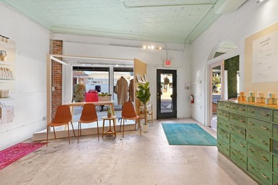 Own a fully operational, two-story historic retail property on - photo 9