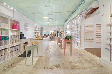 Own a fully operational, two-story historic retail property on - photo 10