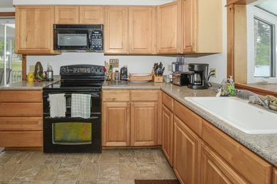 Take in sweeping views of Sebago Lake from the porch, dock, deck - photo 11