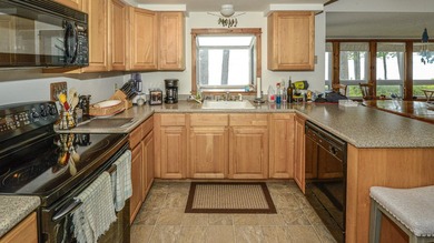 Take in sweeping views of Sebago Lake from the porch, dock, deck - photo 12