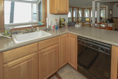 Take in sweeping views of Sebago Lake from the porch, dock, deck - photo 13