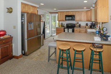 Take in sweeping views of Sebago Lake from the porch, dock, deck - photo 15