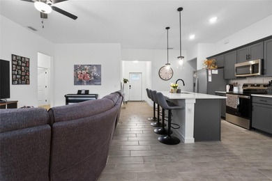 Step into modern Florida living with this beautiful 2025-built - photo 15