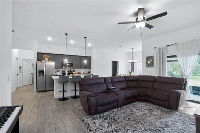 Step into modern Florida living with this beautiful 2025-built - photo 19