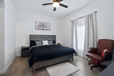Step into modern Florida living with this beautiful 2025-built - photo 20
