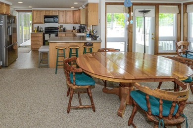 Take in sweeping views of Sebago Lake from the porch, dock, deck - photo 21