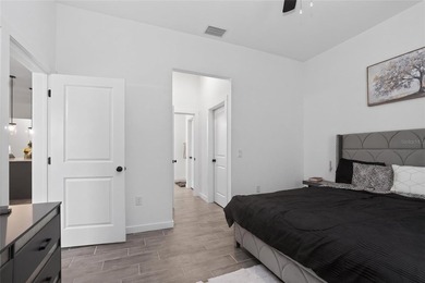 Step into modern Florida living with this beautiful 2025-built - photo 22