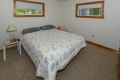 Take in sweeping views of Sebago Lake from the porch, dock, deck - photo 25