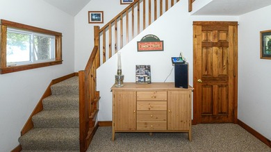Take in sweeping views of Sebago Lake from the porch, dock, deck - photo 31