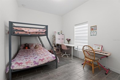 Step into modern Florida living with this beautiful 2025-built - photo 33