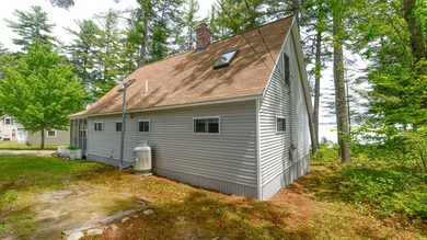 Take in sweeping views of Sebago Lake from the porch, dock, deck - photo 34