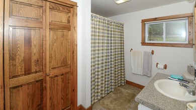 Take in sweeping views of Sebago Lake from the porch, dock, deck - photo 47