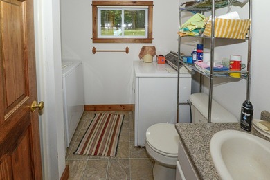 Take in sweeping views of Sebago Lake from the porch, dock, deck - photo 48