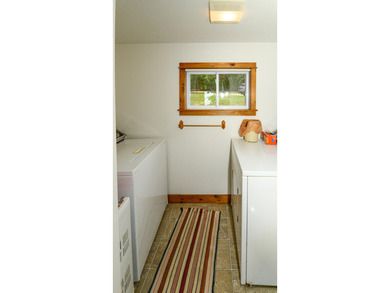Take in sweeping views of Sebago Lake from the porch, dock, deck - photo 49