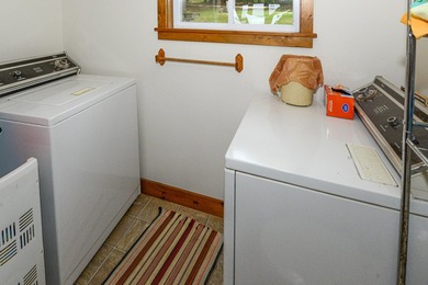 Take in sweeping views of Sebago Lake from the porch, dock, deck - photo 50