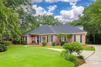 This all brick home is an inviting experience from the moment - photo 2