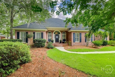 This all brick home is an inviting experience from the moment - photo 3
