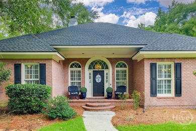 This all brick home is an inviting experience from the moment - photo 4