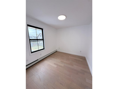 Welcome to this beautifully renovated one-family home with an - photo 12