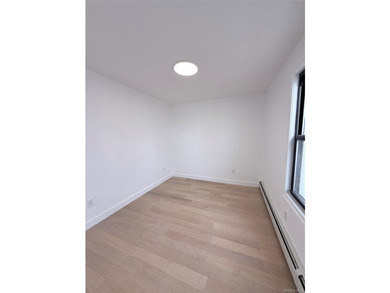 Welcome to this beautifully renovated one-family home with an - photo 13