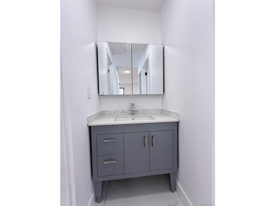 Welcome to this beautifully renovated one-family home with an - photo 15