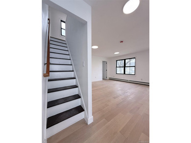 Welcome to this beautifully renovated one-family home with an - photo 18