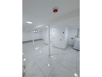 Welcome to this beautifully renovated one-family home with an - photo 20