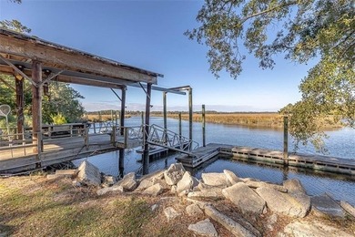 Wake up to breathtaking marshfront sunrises from this 1.13-acre - photo 3