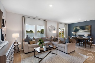 This single-story Dover home design features two bedrooms and a - photo 3