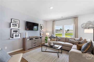 This single-story Dover home design features two bedrooms and a - photo 4