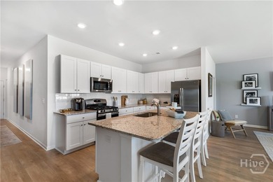This single-story Dover home design features two bedrooms and a - photo 8