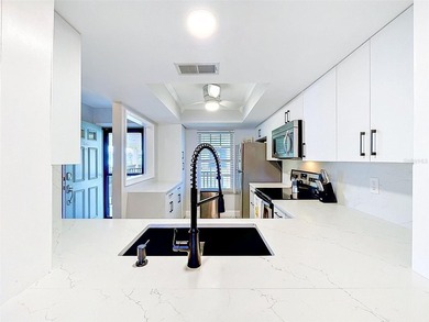 Nestled directly on the Dunedin Causeway, this stunning - photo 11