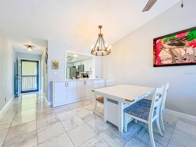 Nestled directly on the Dunedin Causeway, this stunning - photo 12