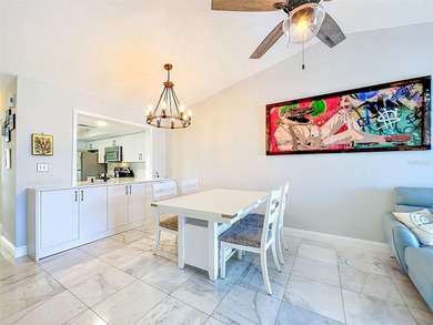 Nestled directly on the Dunedin Causeway, this stunning - photo 13