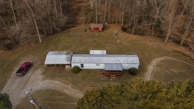 3 bed, 2 bath mobile home on just under 7 acres near Lake Malone - photo 3