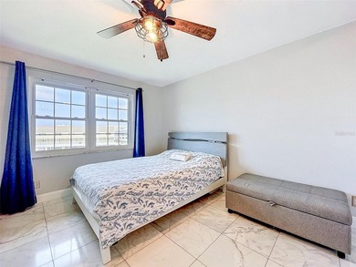 Nestled directly on the Dunedin Causeway, this stunning - photo 25
