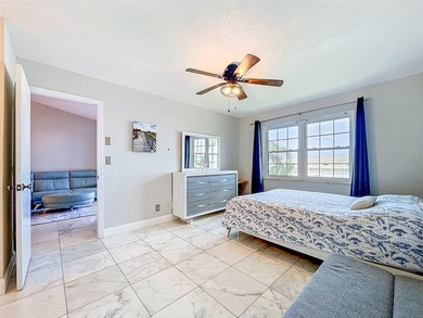 Nestled directly on the Dunedin Causeway, this stunning - photo 26