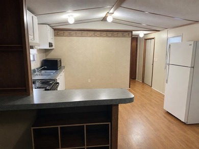 3 bed, 2 bath mobile home on just under 7 acres near Lake Malone - photo 6