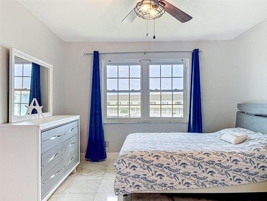 Nestled directly on the Dunedin Causeway, this stunning - photo 28