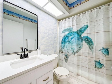 Nestled directly on the Dunedin Causeway, this stunning - photo 32